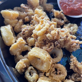Pompano Joe's - Calamari to go but it never made it. - Seafood Near Me - Destin, Florida