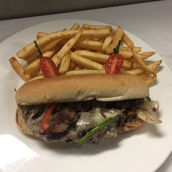 GG Steaks & Spirits - Philly cheesesteak sandwich - Steakhouses Near Me - Gonzales, Texas GG Steaks & Spirits - Philly cheesesteak sandwich - Steakhouses Near Me - Gonzales, Texas