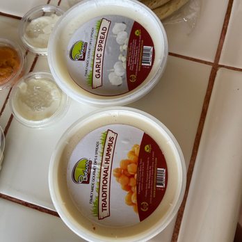 Jerusalem Chicken - $9 each Garlic Sauce and Hummus prepackaged and not made in house....crap - Mediterranean Near Me - Los Angeles, California