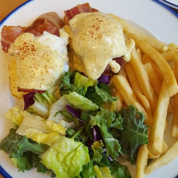 Cafe Morey's - Bacon eggs benedict. Smear that yolky hollandaise sauce on the fries and salad! - American Near Me - Honolulu, Hawaii