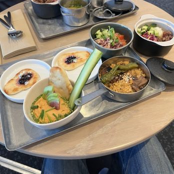 Capital One Lounge - Check out the delicious hot food options - everything was sooo good. - Airport Lounges Near Me - Dallas, Texas Capital One Lounge - Check out the delicious hot food options - everything was sooo good. - Airport Lounges Near Me - Dallas, Texas