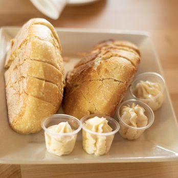 Belmont Brewing - Complimentary sourdough bread with honey butter. - Breweries Near Me - Long Beach, California Belmont Brewing - Complimentary sourdough bread with honey butter. - Breweries Near Me - Long Beach, California