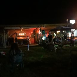 people sitting outside at night people sitting outside at night