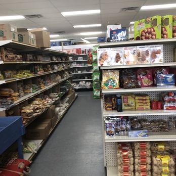 Swadesh Grocery - a grocery store aisle with shelves full of food - International Grocery Near Me - Nottingham MD, Maryland Swadesh Grocery - a grocery store aisle with shelves full of food - International Grocery Near Me - Nottingham MD, Maryland
