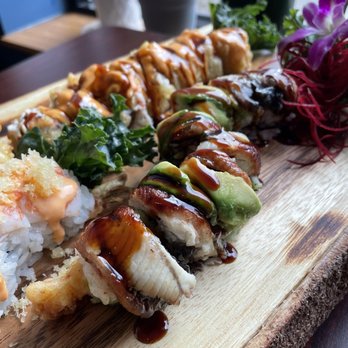 The Sushi Bar - S6. Crunchy Munchy Roll S9. Dragon Roll plus a couple more that we forget the names of hahaha - Sushi Bars Near Me - Taylor, Michigan