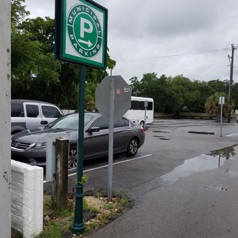 Sarahlu Confections - a parking sign in a parking lot - Custom Cakes Near Me - Miami Shores, Florida