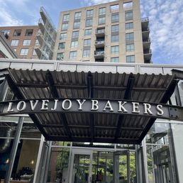 Exterior outside entrance of Lovejoy Bakers - Beautiful day to enjoy the patio seating - Portland, Oregon Exterior outside entrance of Lovejoy Bakers - Beautiful day to enjoy the patio seating - Portland, Oregon