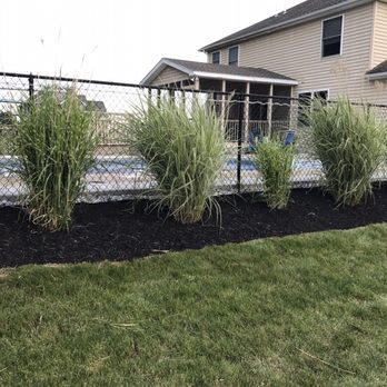 City Lawn & Landscape - Mulched, weeded, and stone around the pool - Snow Removal Near Me City Lawn & Landscape - Mulched, weeded, and stone around the pool - Snow Removal Near Me
