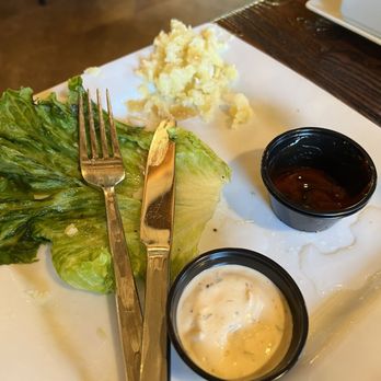 Timber House Lodge - The know is pointing to the undercooked gooey dough from the fish and chips entree. - Hotels Near Me - Chester, California Timber House Lodge - The know is pointing to the undercooked gooey dough from the fish and chips entree. - Hotels Near Me - Chester, California