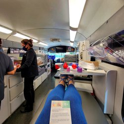 OneBlood Lakeland Hills Donor Center - Aug 2021: Waiting for completion. The two women had 2 beds filled simultaneously w/ another donor seated & waiting her turn