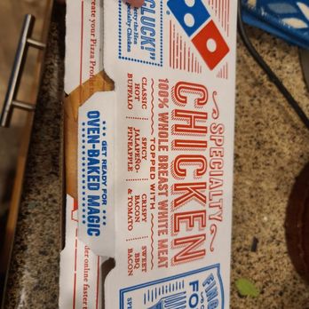 Domino's Pizza - a person holding a box of pizza - Pizza Near Me - Lawrenceburg, Indiana Domino's Pizza - a person holding a box of pizza - Pizza Near Me - Lawrenceburg, Indiana