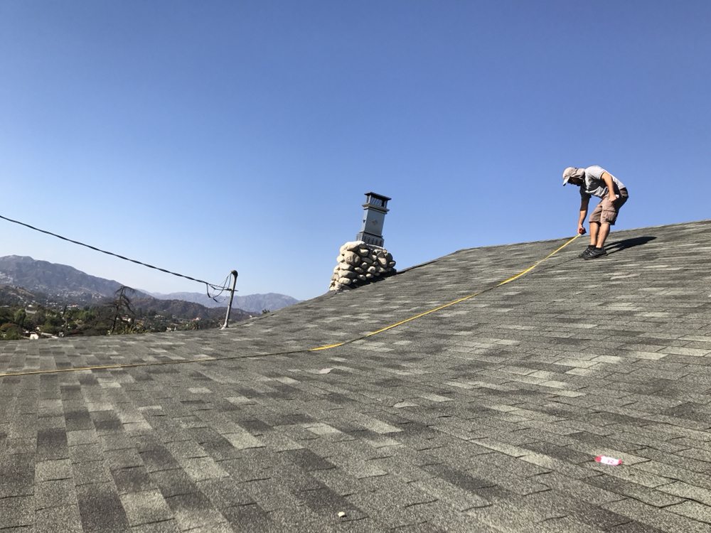 Slide of Top Roofing Inc