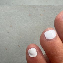 Hill Top Nails - The polish job she did  Looks like a 5 year old polished my toes