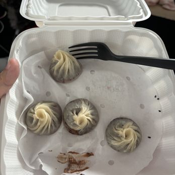 Uncle Dumpling - Chocolate dumplings come with 5. I already ate one - Noodles Near Me - Roseville, California