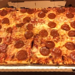 Rossi's Pizza - Endicott - Half sheet of pepperoni.