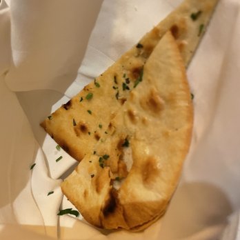 Michael Mina - The bread. This was my undoing.  This was the best thing they had, I think. Served with hummus, tapenade and a yogurt with z'atar. - New American Near Me - Las Vegas, Nevada