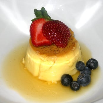 Chandler's - Creme Caramel topped with apple cider caramel and berries - New American Near Me - Petoskey, Michigan