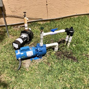 Eagle Eye Landscaping - a blue and white water pump - Landscaping Near Me Eagle Eye Landscaping - a blue and white water pump - Landscaping Near Me