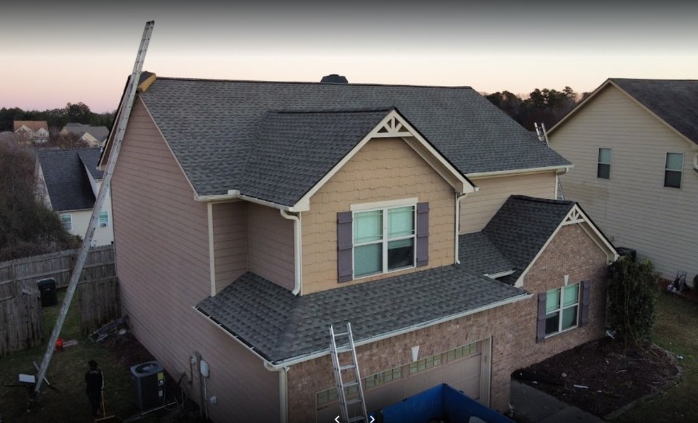 Slide of One Tree Roofing