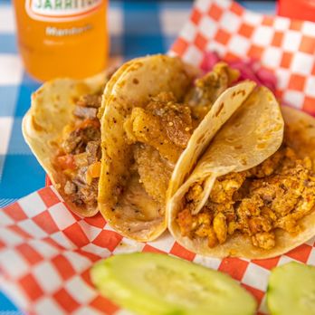 Taco Land - three tacos on a checkered table cloth - Tacos Near Me - Anaheim, California