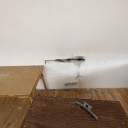 Northern Air Quality Services - Mould behind furniture due to limited convective drying and high humidity is a common problem we solve.