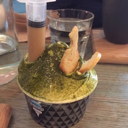 Kaya and pandan gelato covered w matcha powder, shot of peanut butter ganache and baguette toasts. Yum. Kaya and pandan gelato covered w matcha powder, shot of peanut butter ganache and baguette toasts. Yum.
