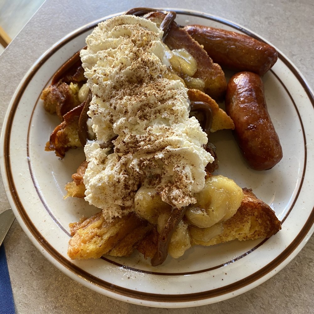 Buttermilk's Farmhouse - Bananas Foster French toast with sausage - Breakfast & Brunch Near Me - Patchogue, New York Buttermilk's Farmhouse - Bananas Foster French toast with sausage - Breakfast & Brunch Near Me - Patchogue, New York