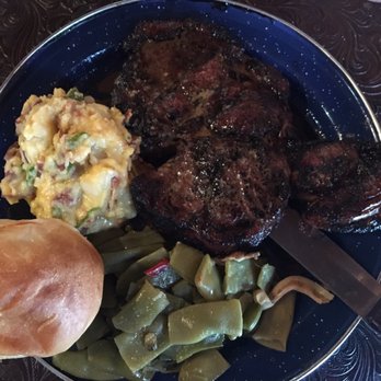 Big Jake's Western Dive - 14oz Ribeye. Comes with a salad, 2 more sides and a roll! - Burgers Near Me - Moscow, Texas Big Jake's Western Dive - 14oz Ribeye. Comes with a salad, 2 more sides and a roll! - Burgers Near Me - Moscow, Texas