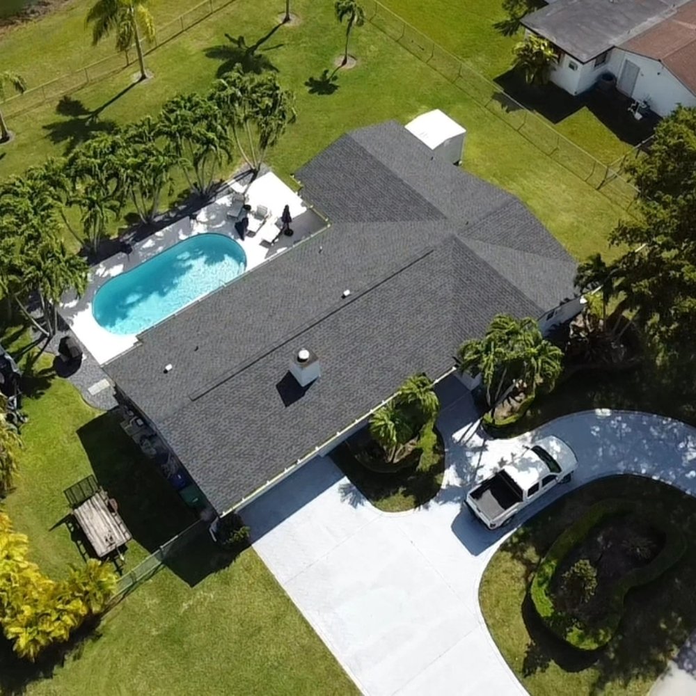 Slide of Molina's Roofing Services