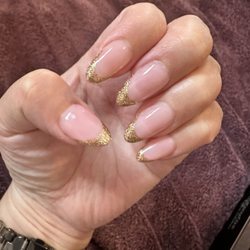 Top Coat Nail Lounge - Gel X with gold french.