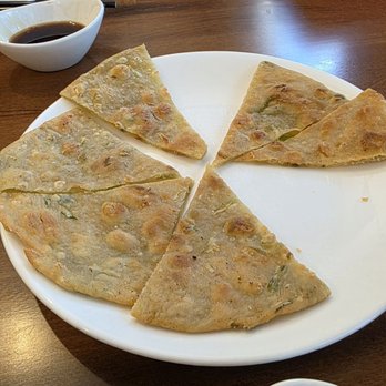 Dumpling House - Scallion pancake- very doey and not flakey crispy at all - Chinese Near Me - Fairfield, California Dumpling House - Scallion pancake- very doey and not flakey crispy at all - Chinese Near Me - Fairfield, California