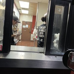 Jack in the Box - This is the new guy in training on his cellphone and sipping his soda and playing with his phone after 45 minutes