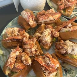 The Lobster Pot - Home made lobster rolls on Pepperidge Farm butter d and toasted side cut brioche buns