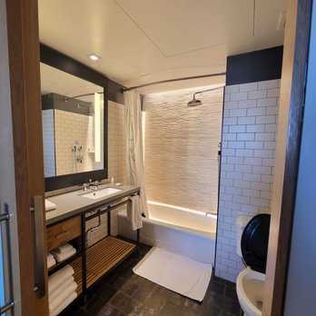 Hotel 50 Bowery - Bathrooms are modern and well appointed. Rainfall showerhead is intoxicating. - Hotels Near Me - New York, New York