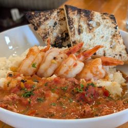 The brightest, healthiest chimp & grits you'll ever have. Not greasy or cheesy or buttery. Just flavorful. Shrimp unfortunately overcooked.