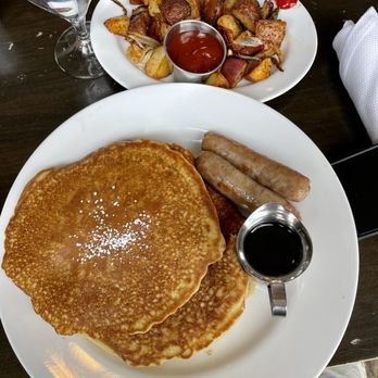 Lifesaving Station - Buttermilk Hotcakes, comes with choice of sausage or bacon. Side order of home fries in background. - Breakfast & Brunch Near Me - Duck, North Carolina