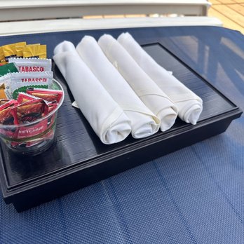 Hinana Bar - The bento box with silverware and sauces - Lounges Near Me - Honolulu, Hawaii