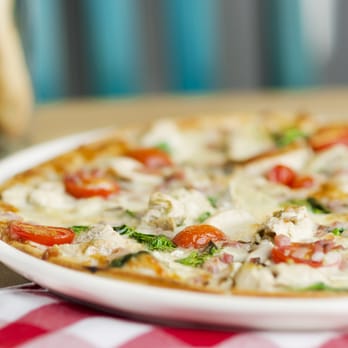 Fellini Koolini's - a pizza on a plate - Italian Near Me - London, Ontario Fellini Koolini's - a pizza on a plate - Italian Near Me - London, Ontario