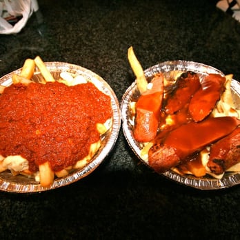 Zogs Dogs - poutine with marinara sauce and classic poutine with sausage. - Hot Dogs Near Me - Whistler, British Columbia Zogs Dogs - poutine with marinara sauce and classic poutine with sausage. - Hot Dogs Near Me - Whistler, British Columbia