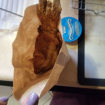 Lawrence's Fish & Shrimp - A while catfish dropped in a paper bag - Chicken Wings Near Me - Chicago, Illinois