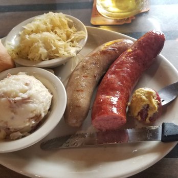 The Auslander - Fancy German hot dogs with mustard, kraut, taters, and a roll. Yeeehaw!!! - German Near Me - Fredericksburg, Texas The Auslander - Fancy German hot dogs with mustard, kraut, taters, and a roll. Yeeehaw!!! - German Near Me - Fredericksburg, Texas