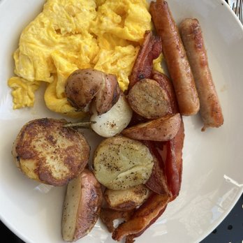 Our Nest - The sides that come with the French toast (potatoes are extra) - Breakfast & Brunch Near Me - Fullerton, California Our Nest - The sides that come with the French toast (potatoes are extra) - Breakfast & Brunch Near Me - Fullerton, California