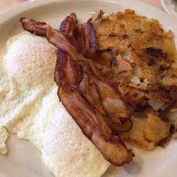 Two eggs bacon and potatoes