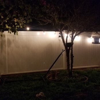 Neto's Fence - a backyard with a table and chairs - Fences & Gates Near Me - Oxnard, California Neto's Fence - a backyard with a table and chairs - Fences & Gates Near Me - Oxnard, California