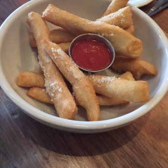 Cane Rosso - Angioletti so good. Fried pizza dough with Parmesan and dipping sauce - Pizza Near Me - Dallas, Texas Cane Rosso - Angioletti so good. Fried pizza dough with Parmesan and dipping sauce - Pizza Near Me - Dallas, Texas