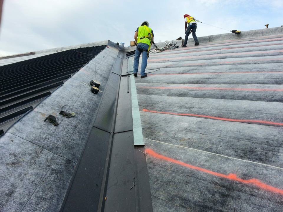 Slide of Patch Adams Roofing