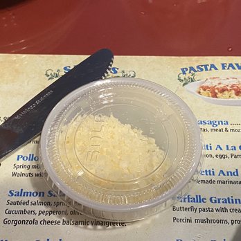 Palermo Restaurant Italian Cucina - As our server walked away, he asked if we'd like some Parmesan Cheese. We both said yes and we each got one of these little tubs. - Italian Near Me - Modesto, California Palermo Restaurant Italian Cucina - As our server walked away, he asked if we'd like some Parmesan Cheese. We both said yes and we each got one of these little tubs. - Italian Near Me - Modesto, California