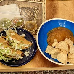 Taqueria Potrillos - Chile relleno and 2 potato tacos with chips and salsa to go.