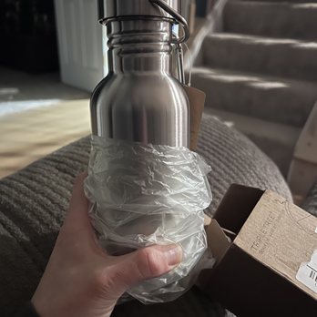 Walmart Supercenter - a person holding a water bottle wrapped in plastic - Department Stores Near Me - Florence, Kentucky