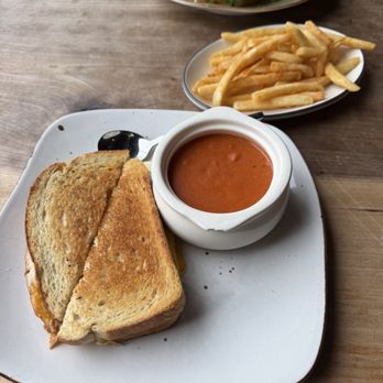 Parkside Restaurant - Auntie Nessa with Tomato Bisque and a side of fries. - American Near Me - Raleigh, North Carolina